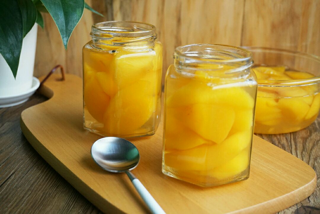 黄桃罐头是热的装瓶还是冷的 (黄桃罐头是热的装瓶还是冷的 黄桃罐头用硬桃还是软桃)